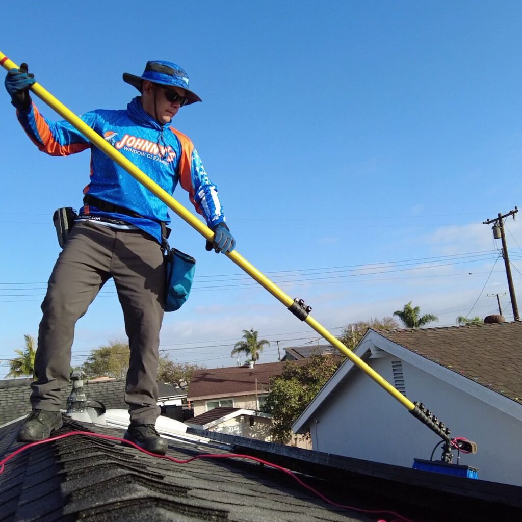 Johnny Cleaning Solar Panels